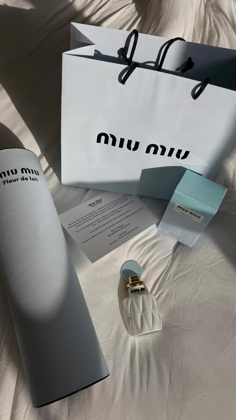 Instagram post by @00anita_rod for Miu Miu. Caption reads: #giftedbymiumiu @miumiu #fleurdelaitmiumiu....