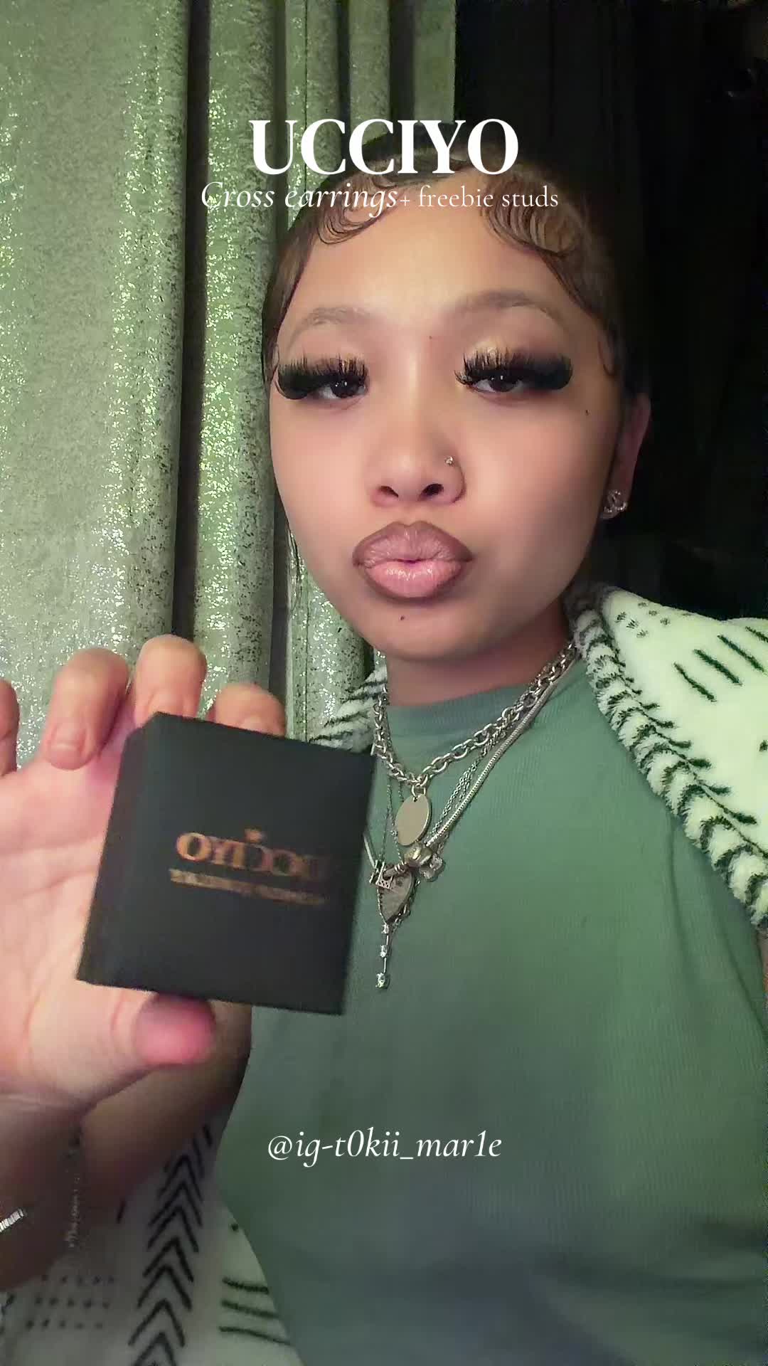 TikTok post by @toki.marie_ for Ucciyo Brand. Caption reads: Cute earrings plus an extra pair I love it!!....