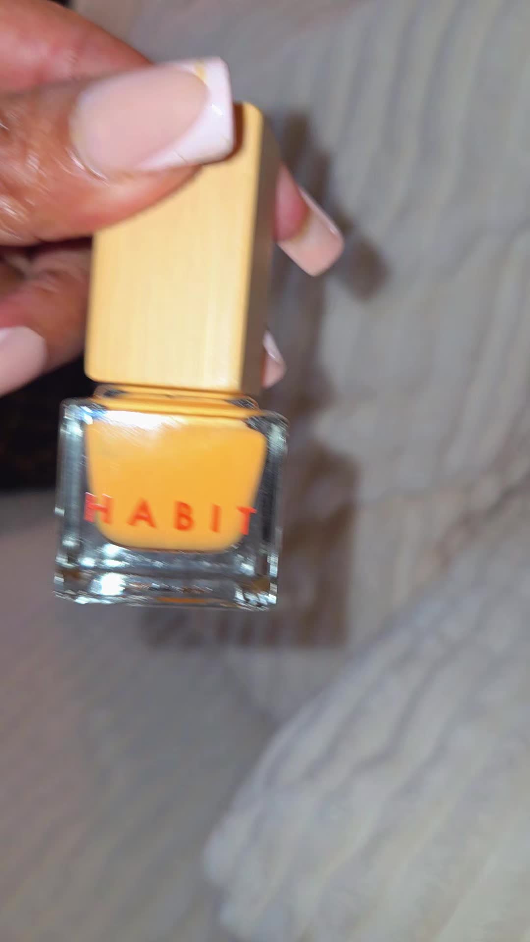 TikTok post by @nikki.ewing0 for Habit Cosmetics. Caption reads: @Habit Cosmetics Nail Polish 💅 #nail #polish.