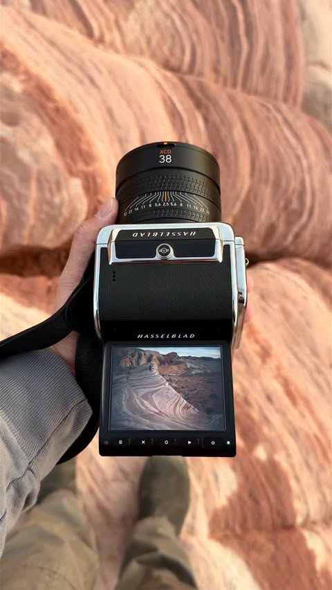 Instagram post by @kylersteele for Hasselblad. Caption reads: Waist Level Photography on the Hasselblad 907X &....