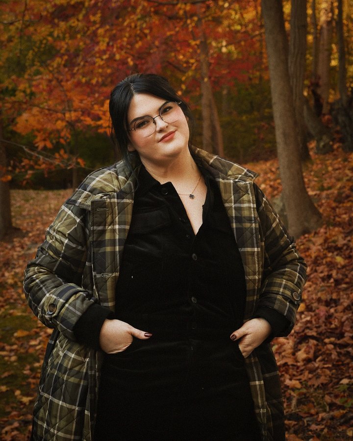 Instagram post by @roseybeeme for Universal Standard. Caption reads: Fine , I’ll read The Secret History again. (As....