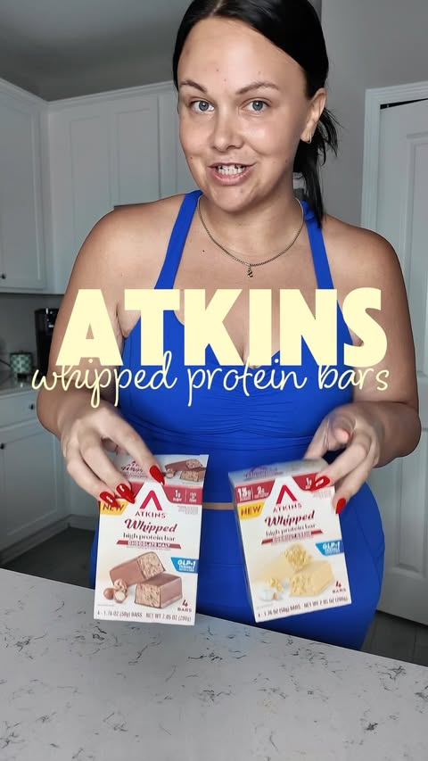 Instagram post by @shannon.nicolewilliams for Atkins. Caption reads: [...] protein bars, but the texture of the new....