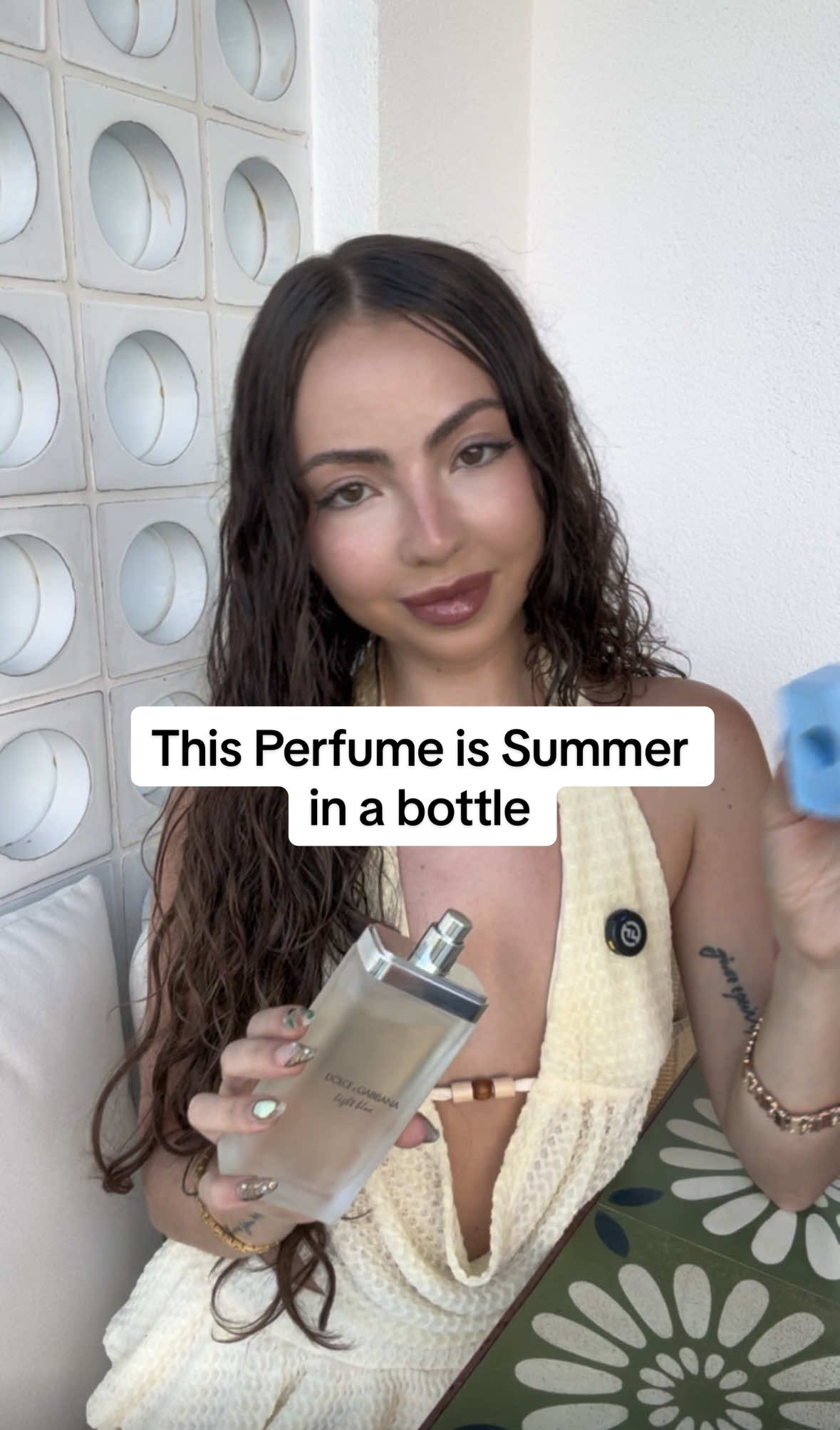 TikTok post by @perfumesiren for Dolce&Gabbana. Caption reads: Bottle up the smell of summer & it would be Light....