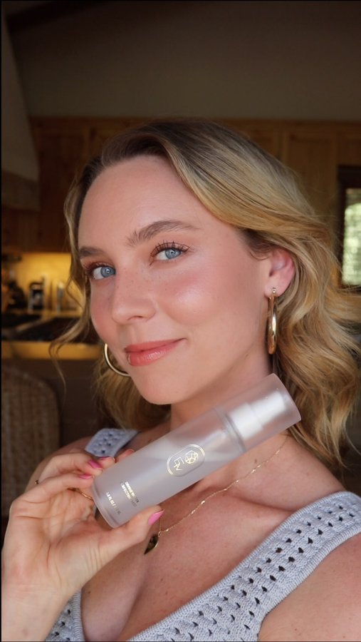 Instagram post by @stateofkait for EM Cosmetics. Caption reads: @emcosmetics launched their Divine Water....