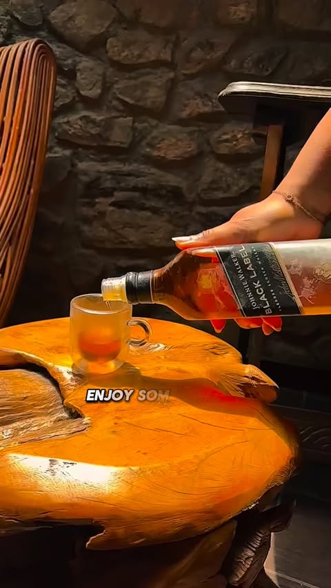 Instagram post by @munachiabii for Johnnie Walker. Caption reads: [...] somehow needed. Keep walking with....