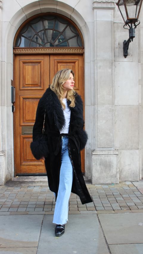 Instagram post by @styleandmakaroni for Oasis Fashion. Caption reads: The coat of my dreams @oasisfashion x....