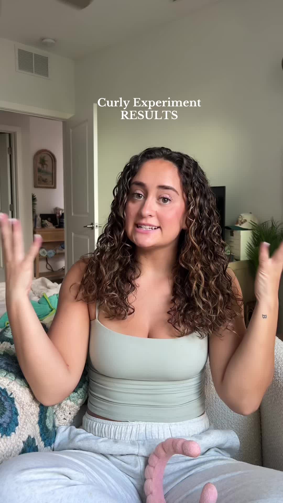 TikTok post by @morgan.elizabith for John Frieda. Caption reads: Using @John Frieda to scrunch out today....