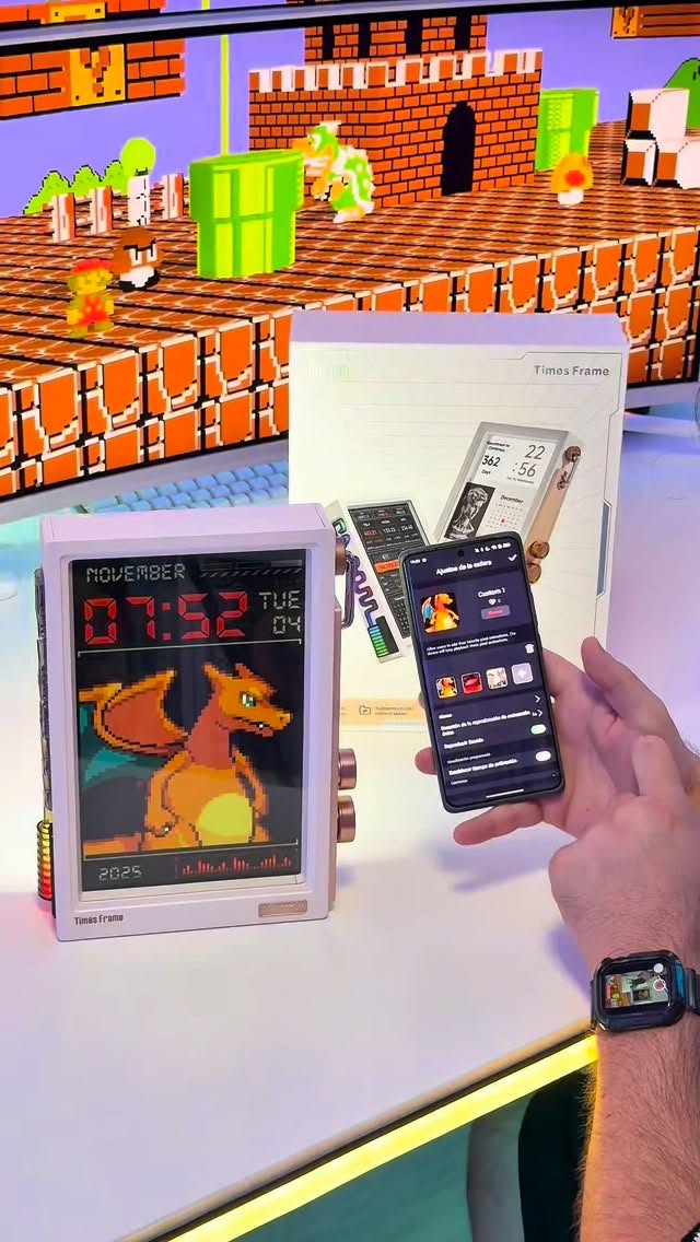 Instagram post by @javigeek for Divoom. Caption reads: Unboxing DIVOOM TIMES FRAME de @divoom_global....