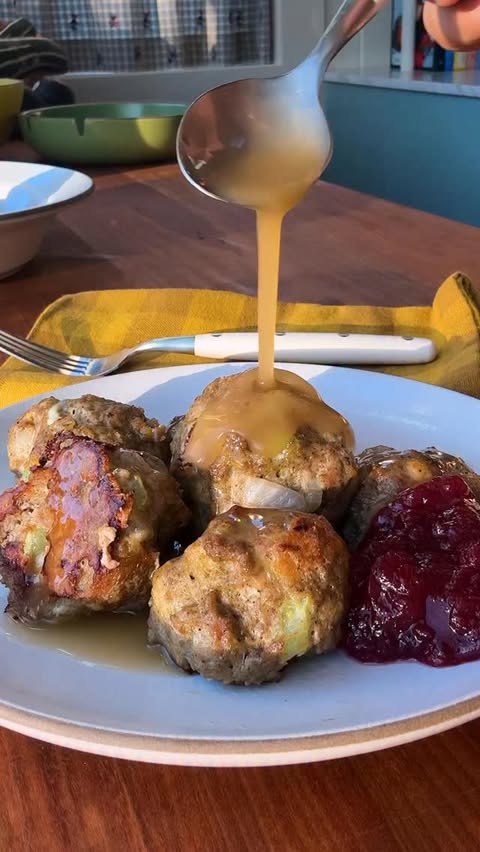 Instagram post by @grossypelosi for NYT Cooking. Caption reads: TURKEY STUFFING MEATBALLS 🤗 Perfect for when you....