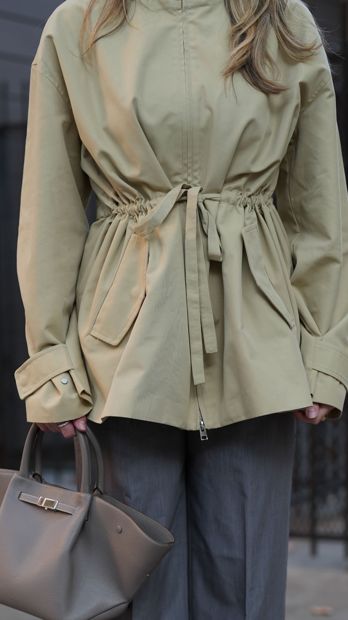 Instagram post by @_pamelaresende for REVOLVE. Caption reads: #ad fall colors 🩶🫒 jacket & pant @lacademie_ ....