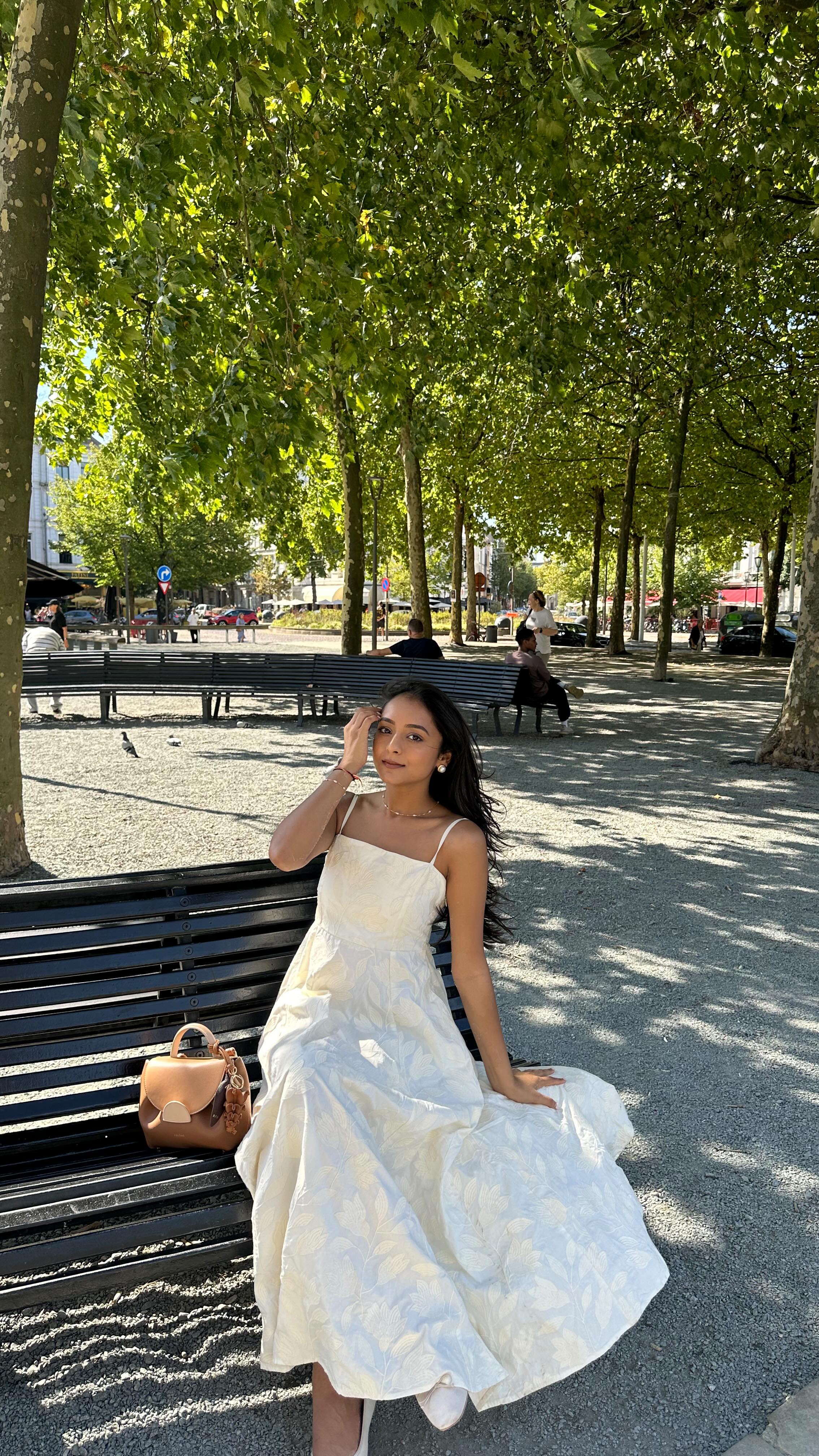 Instagram post by @brinda.ptl for Polène Paris. Caption reads: I’m convinced midi dresses are made for the....