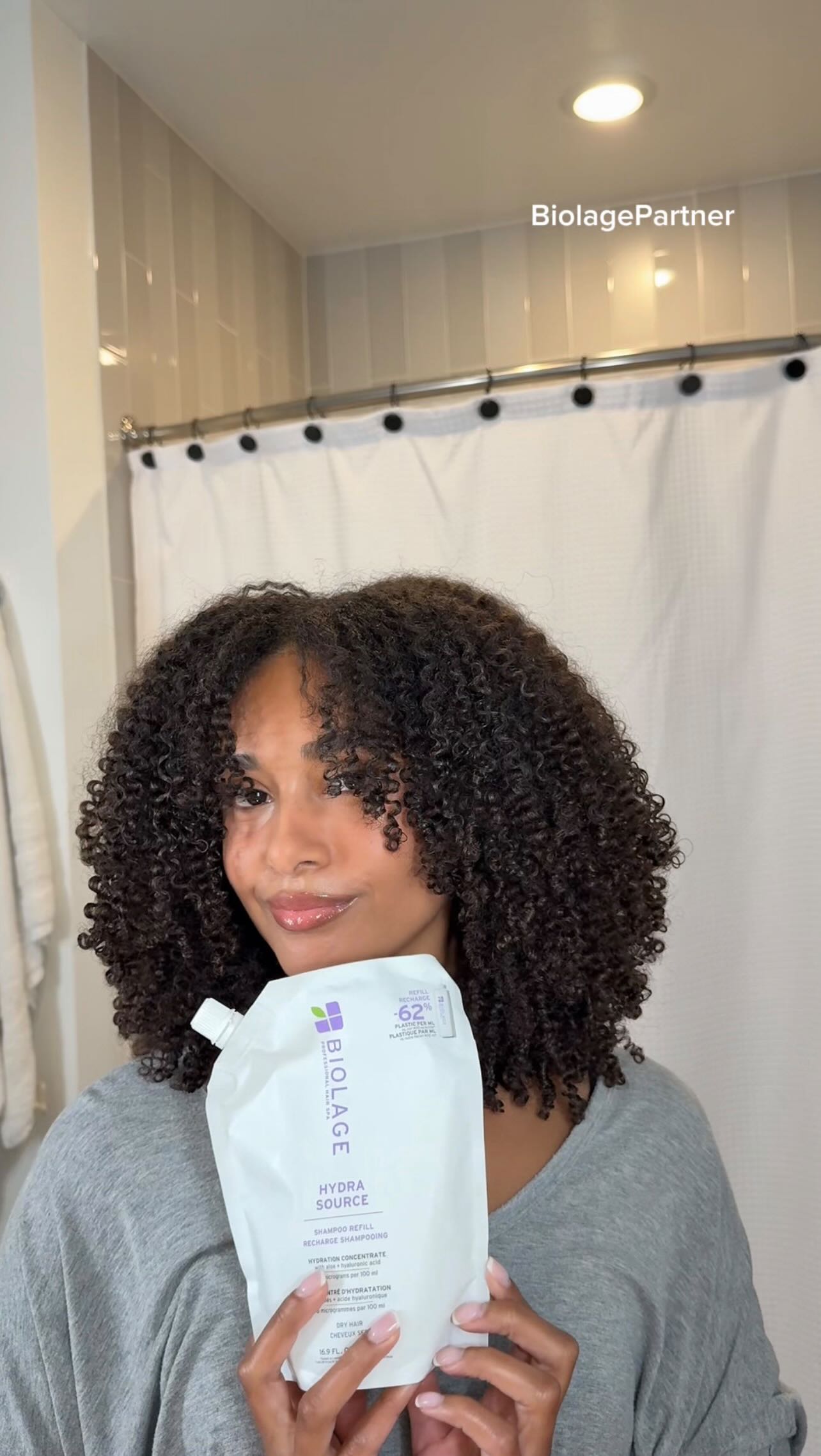 Instagram post by @miriah_celeste for Biolage. Caption reads: Big hydration, less waste! 💧 @biolage ....