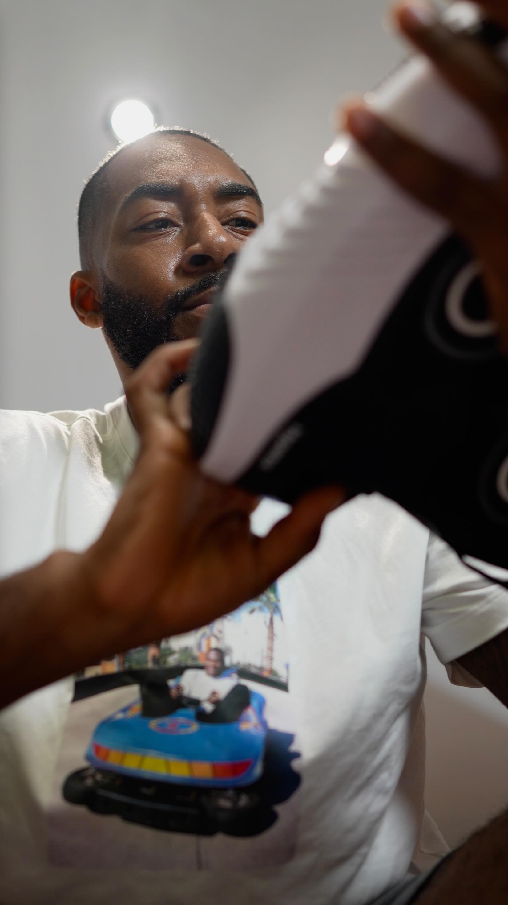 Instagram post by @fear.on for Hyperice. Caption reads: Just got my hands (feet) on the Nike x Hyperice....