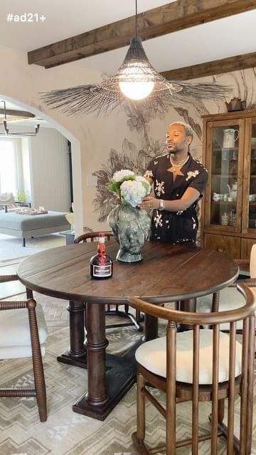 Instagram post by @moorehisstyle for Grand Marnier. Caption reads: #ad21+ This is your sign to invite your friends....