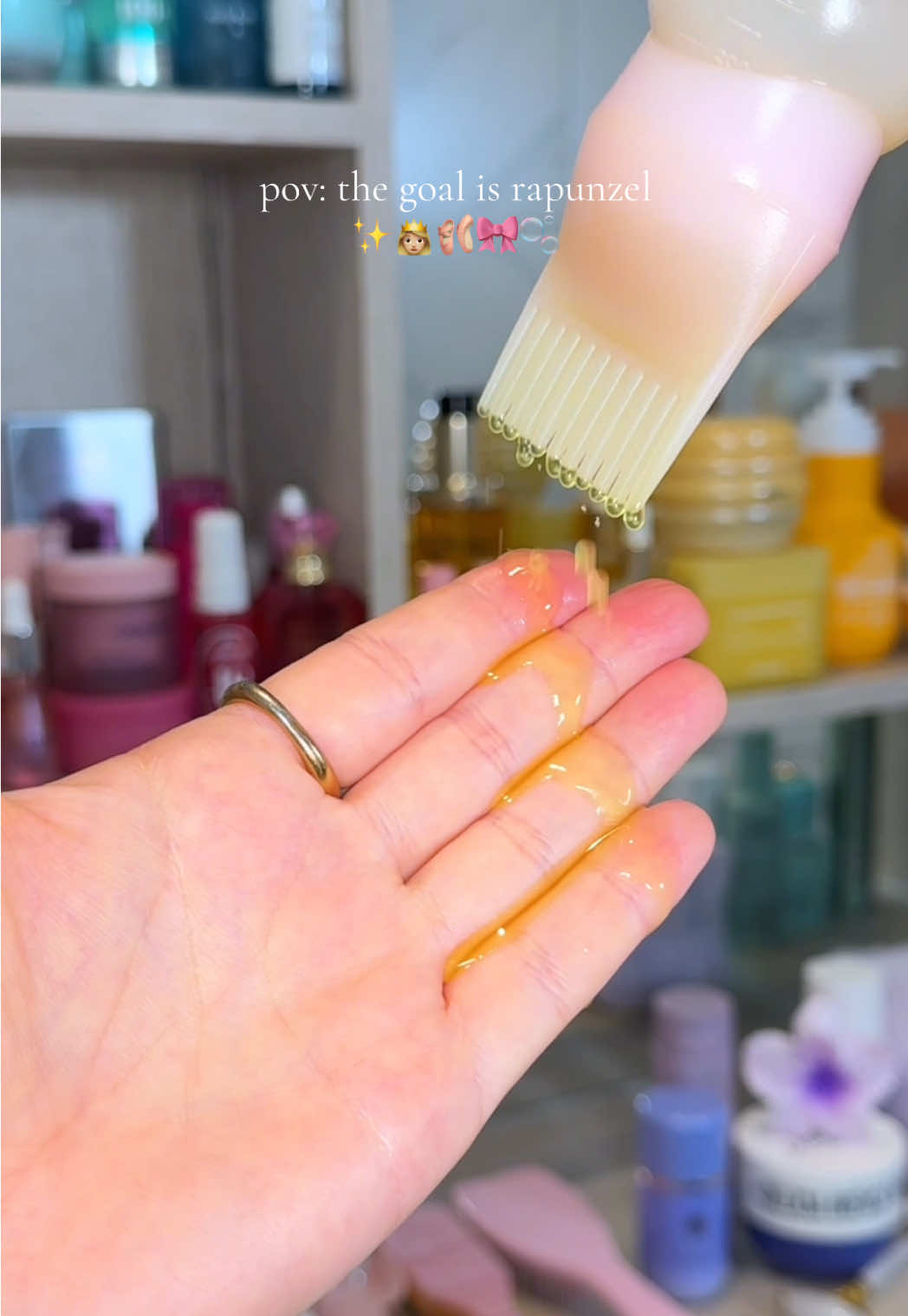 TikTok post by @by.emmaleah for Emi Jay. Caption reads: [...] for 2026 ✨👸🏼🩰🎀🫧 products @Emi Jay....
