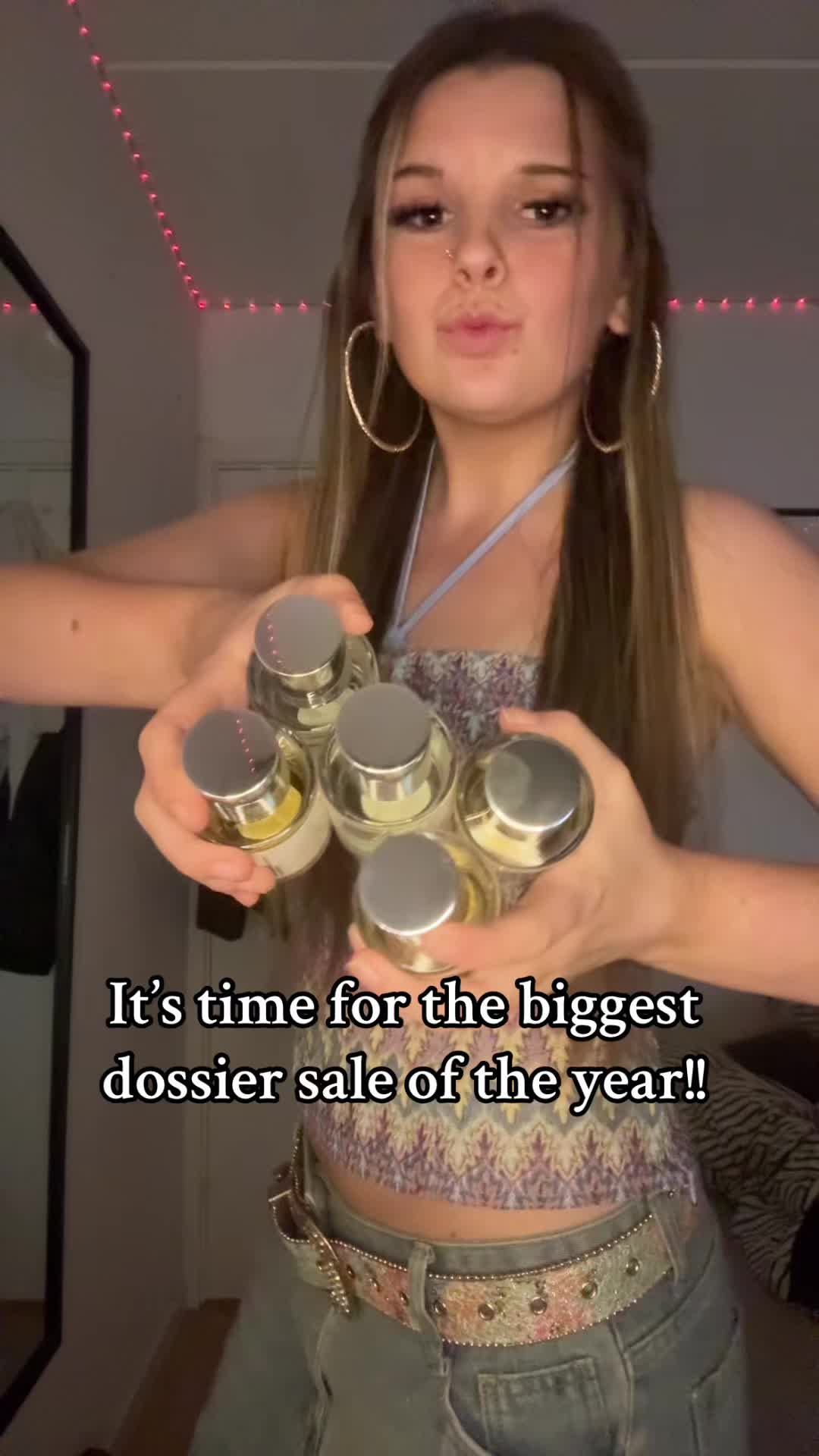 TikTok post by @ziw.nebel for Dossier. Caption reads: Dossier is doing up to 50% off for Black Friday!!!....