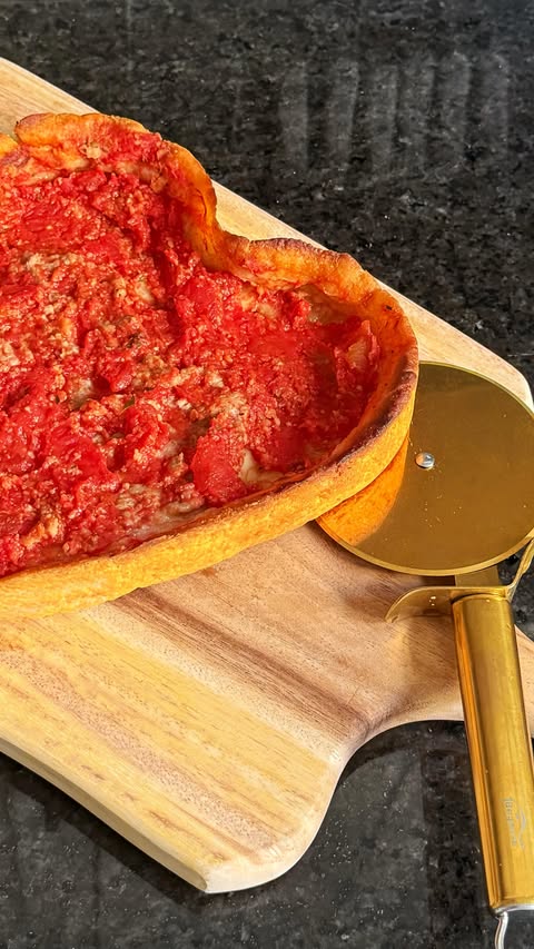 Instagram post by @buymechanel for Lou Malnati's. Caption reads: [...] a quick stop at my favorite spot,....