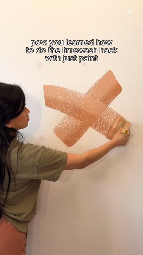 Instagram post by @tinalemac for BEHR Paint. Caption reads: [...] with this limewash paint hack using....