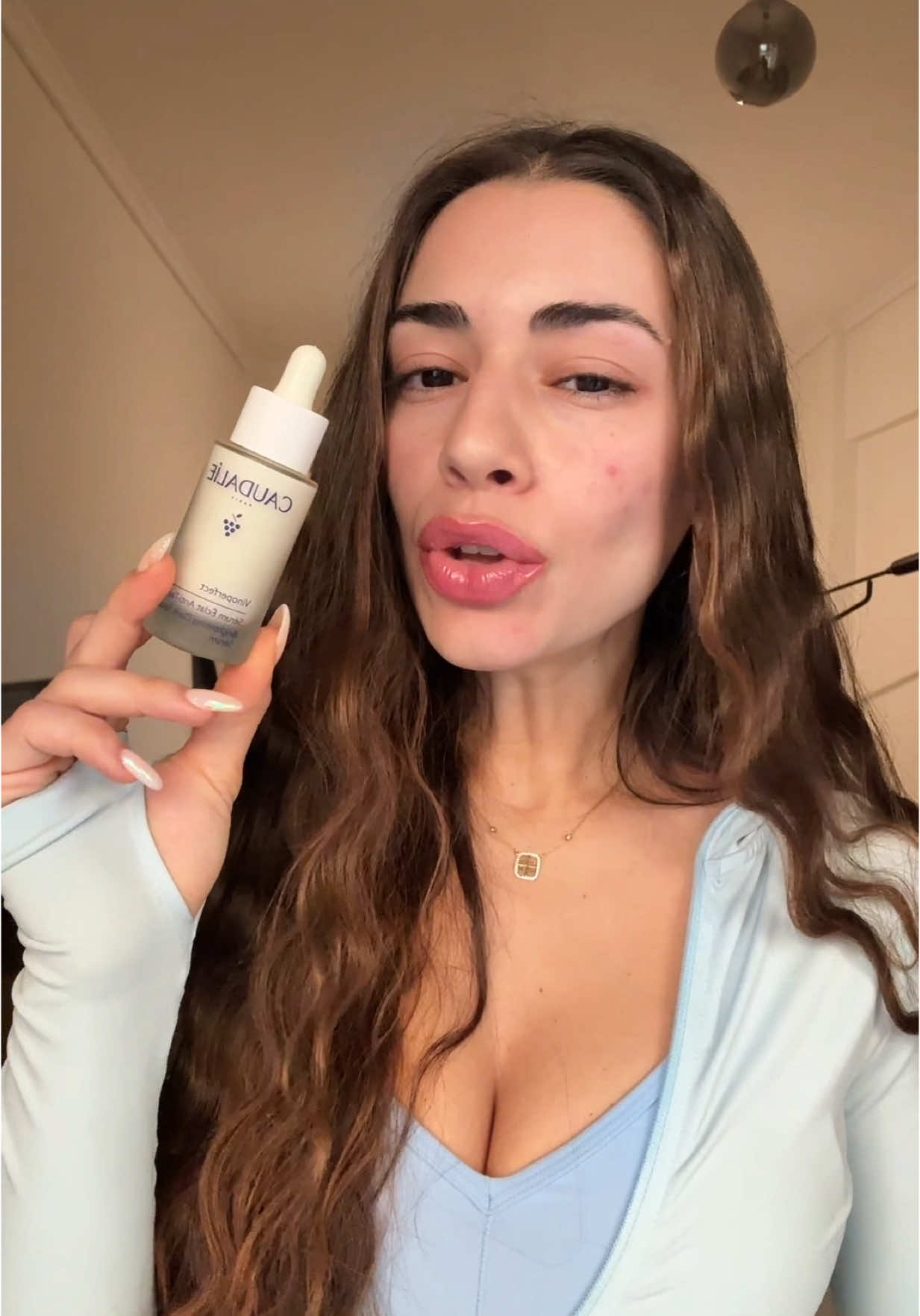 TikTok post by @amaliaaat for Caudalie. Caption reads: 1 μπουκάλι κάθε 15 ΔΕΥΤΕΡΟΛΕΠΤΑ;! @Caudalie....