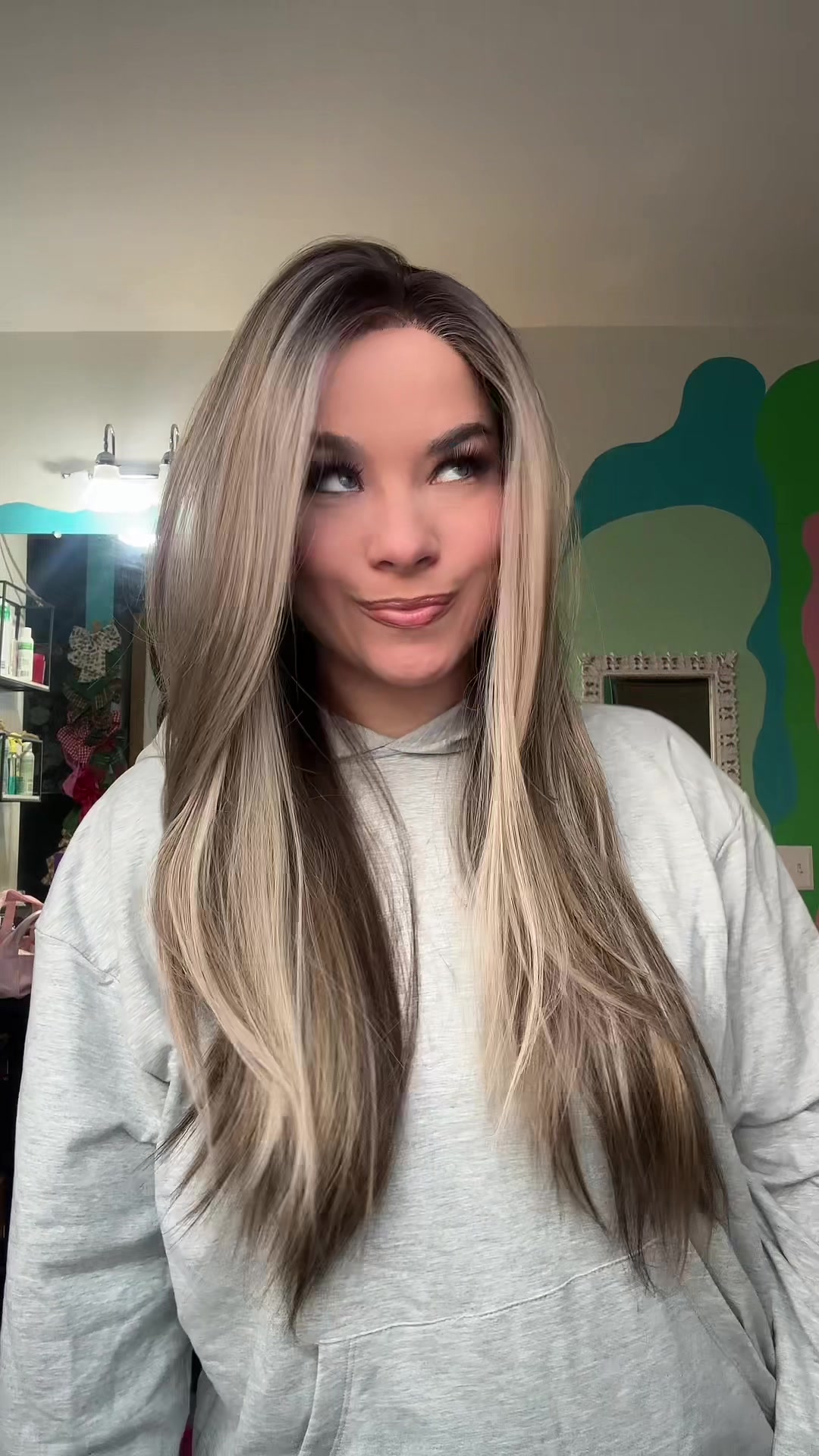 TikTok post by @elizabethwearswigs for Chelsey Smith Cosmetics. Caption reads: Wig is Camilla from @Chelsey Smith Crowns....