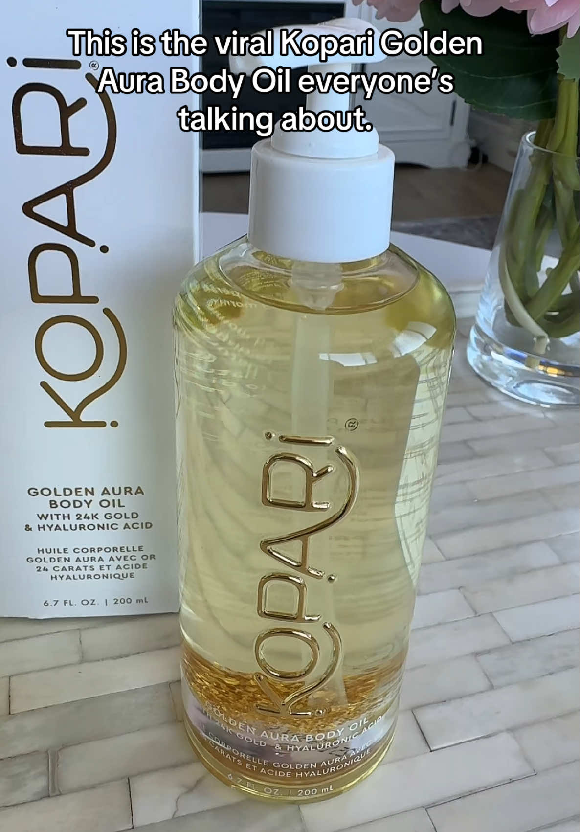 TikTok post by @mia_manhattan_ny for Kopari Beauty. Caption reads: The glow everyone’s chasing ✨ Kopari Golden Aura....