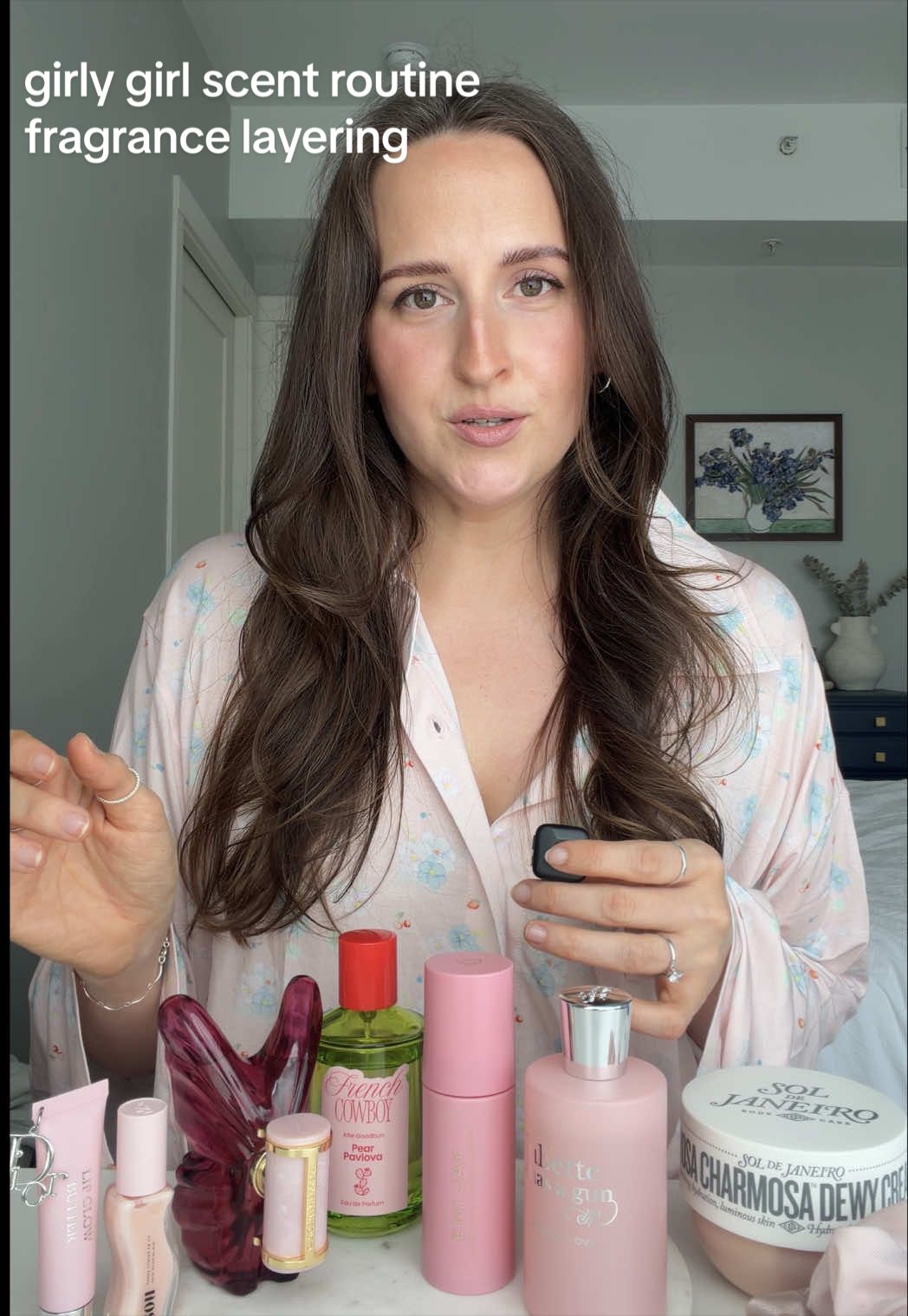TikTok post by @kristinfragrances for Emi Jay. Caption reads: [...] de Janeiro Rosa Charmosa * HAIR 👱🏼‍♀️ @Emi....