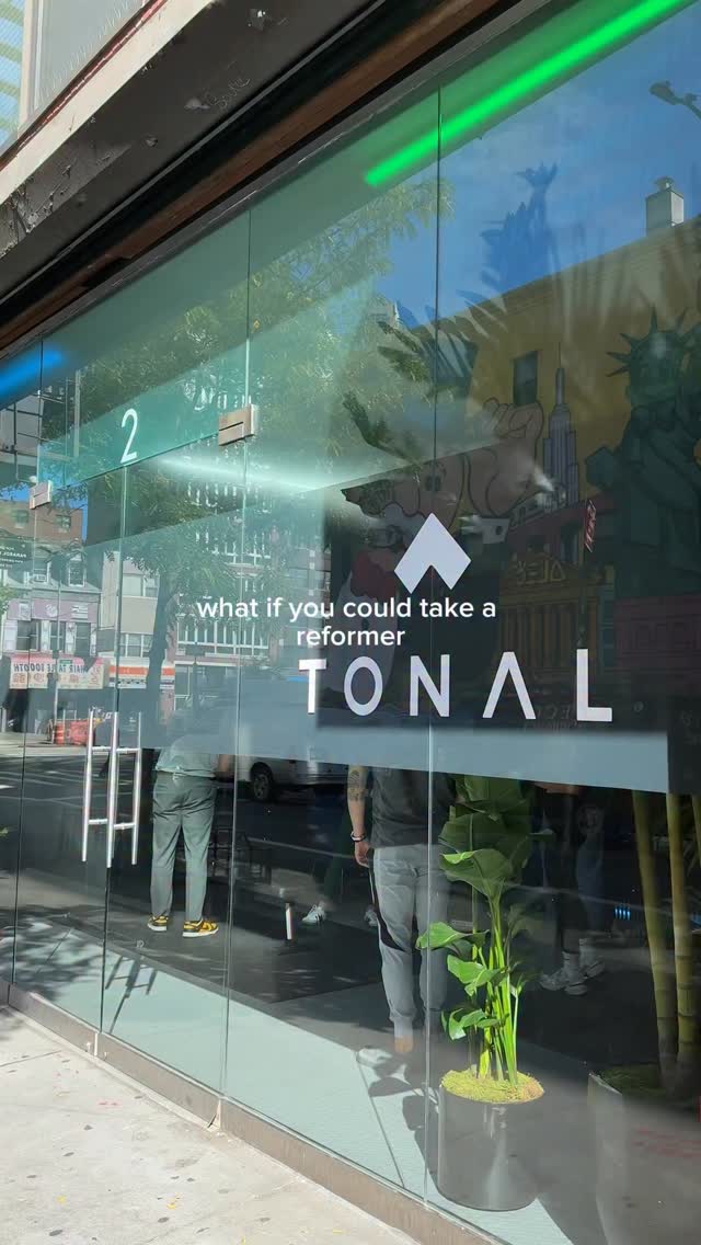 Instagram post by @thedailyschvitz for Tonal. Caption reads: [...] training all in1? Sign me up🙋‍♀️ @tonal....