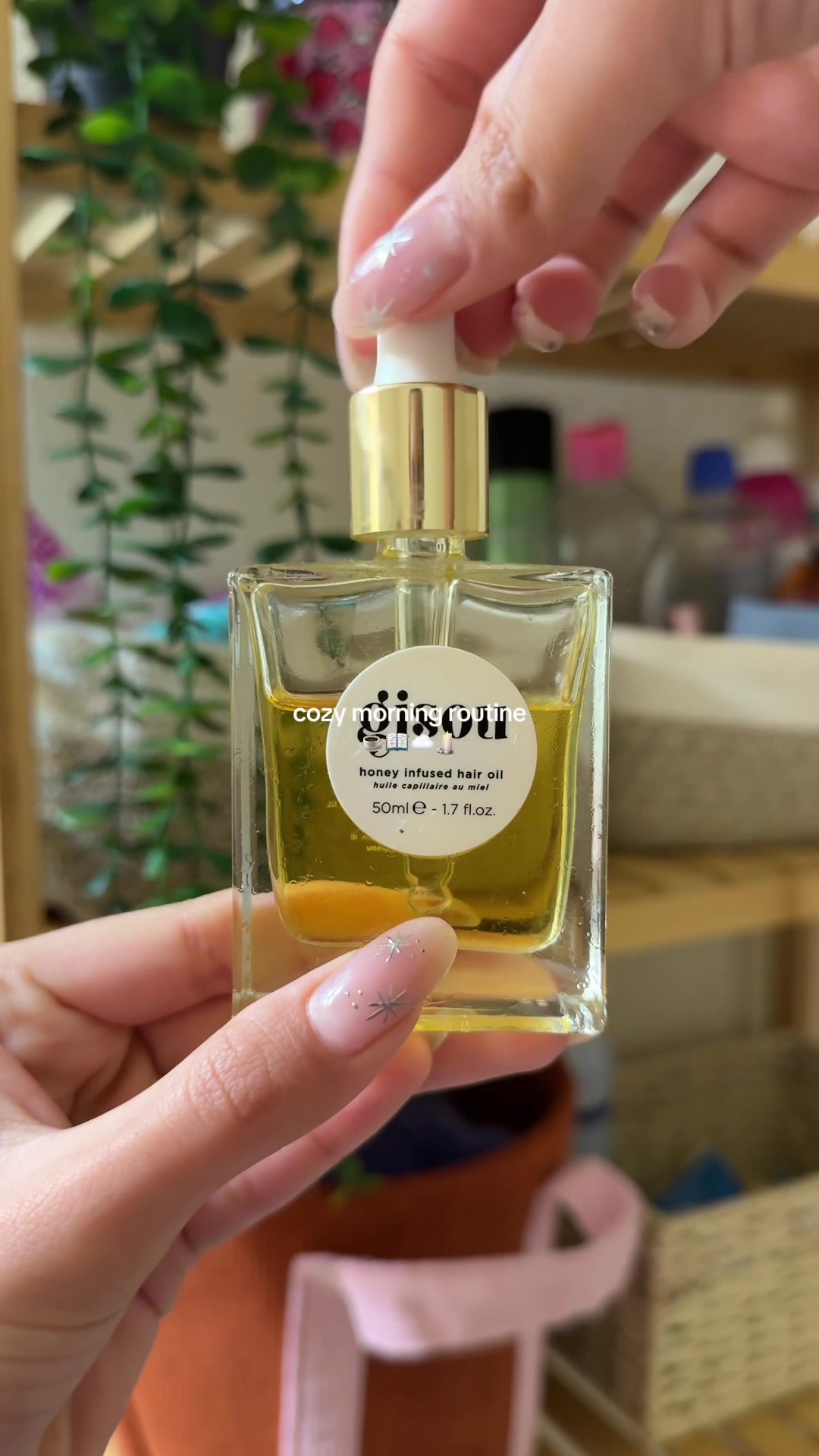 TikTok post by @jazsat for Victoria's Secret. Caption reads: cozy morning routine! 🕯️📖☁️ #pinterestaesthetic....