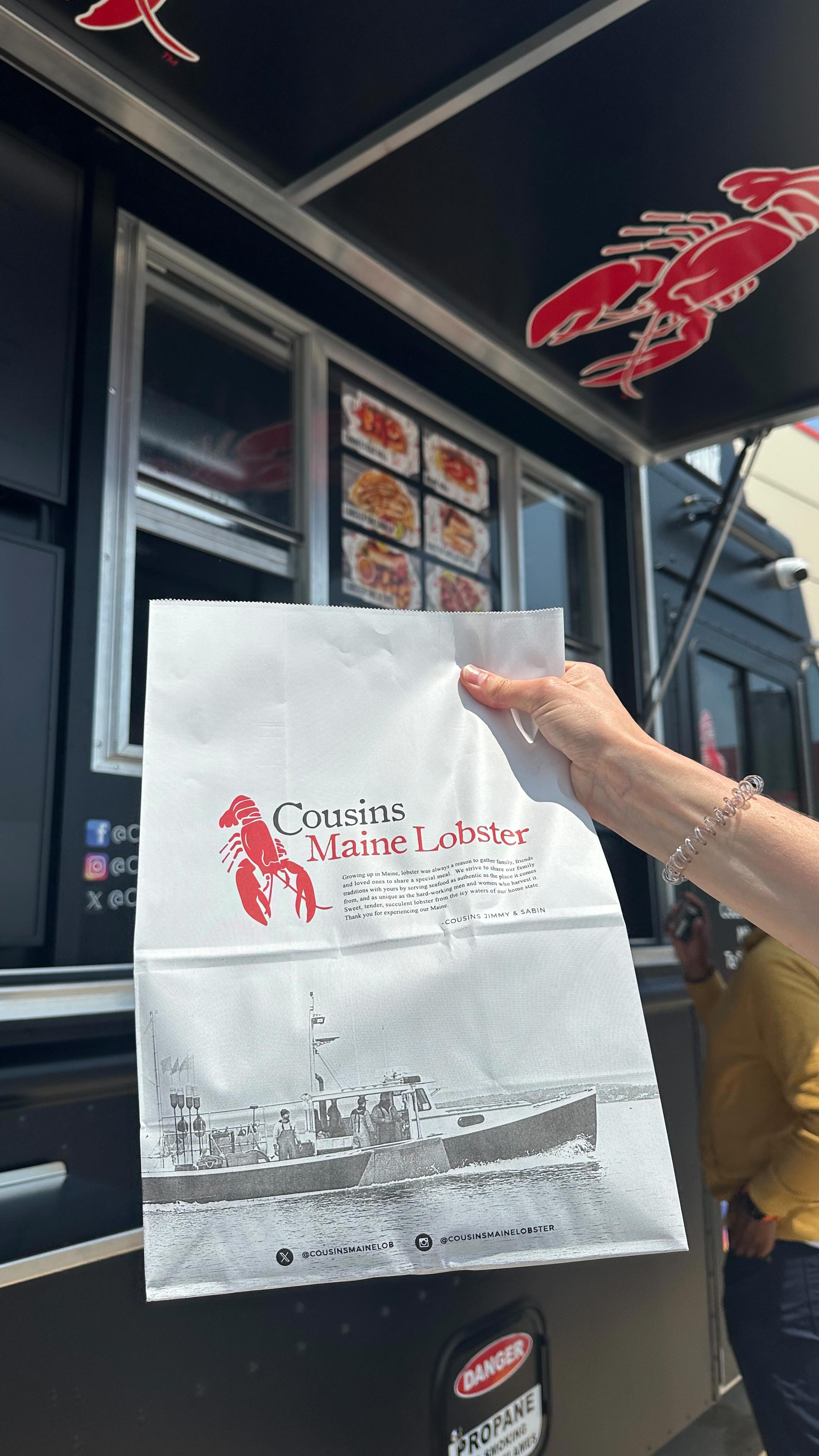 Instagram post by @milwaukeebeer.blog for Cousins Maine Lobster. Caption reads: Taste delicious lobster at @cousinsmainelobster 🦞....