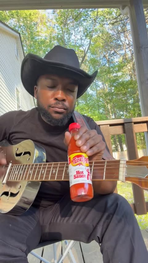 Instagram post by @devinshamel for Texas Pete. Caption reads: [...] is the best way to play guitar #ad....