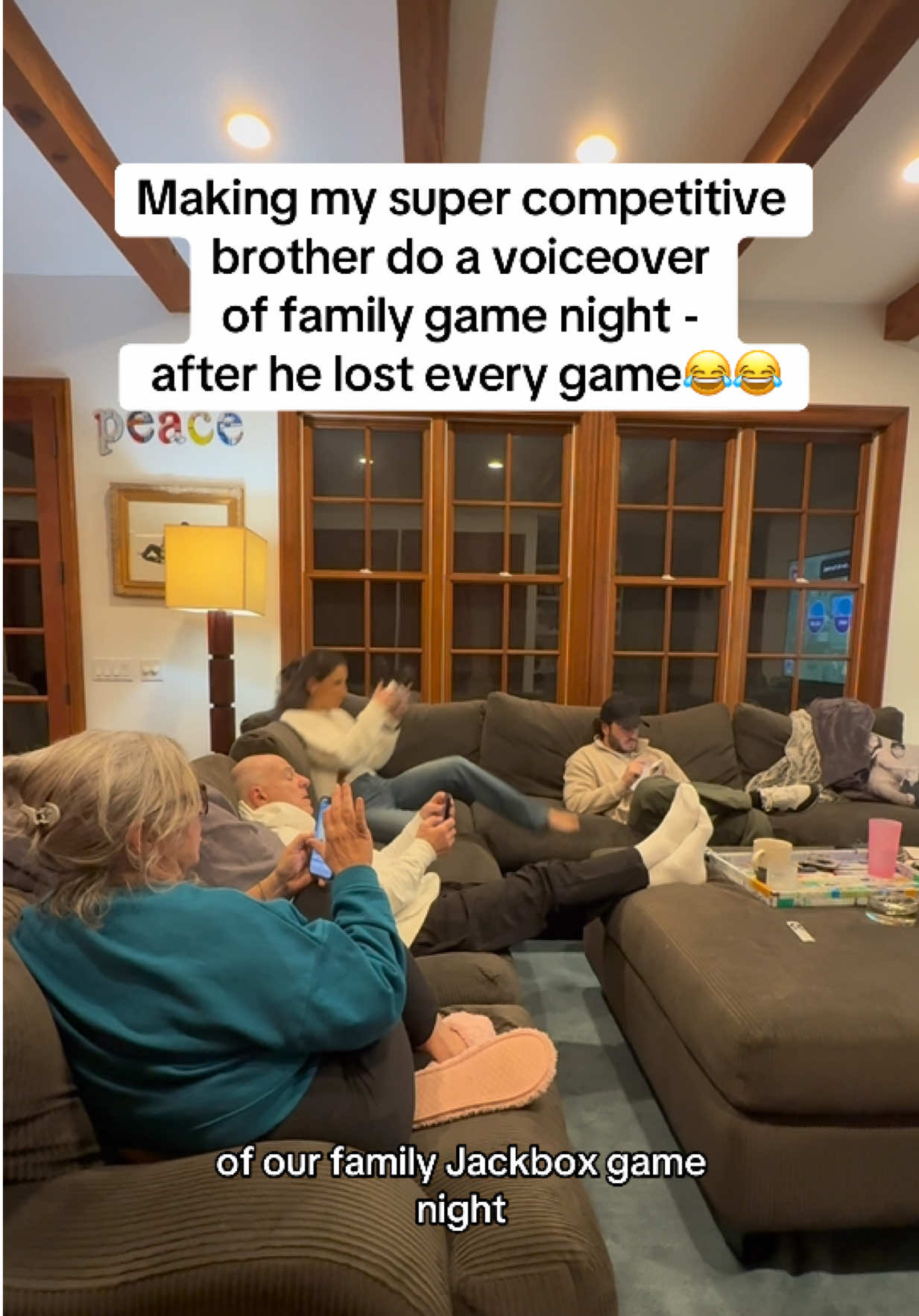 TikTok post by @zelonfamily for Jackbox Games. Caption reads: Wouldn’t be a family game night without Luke....