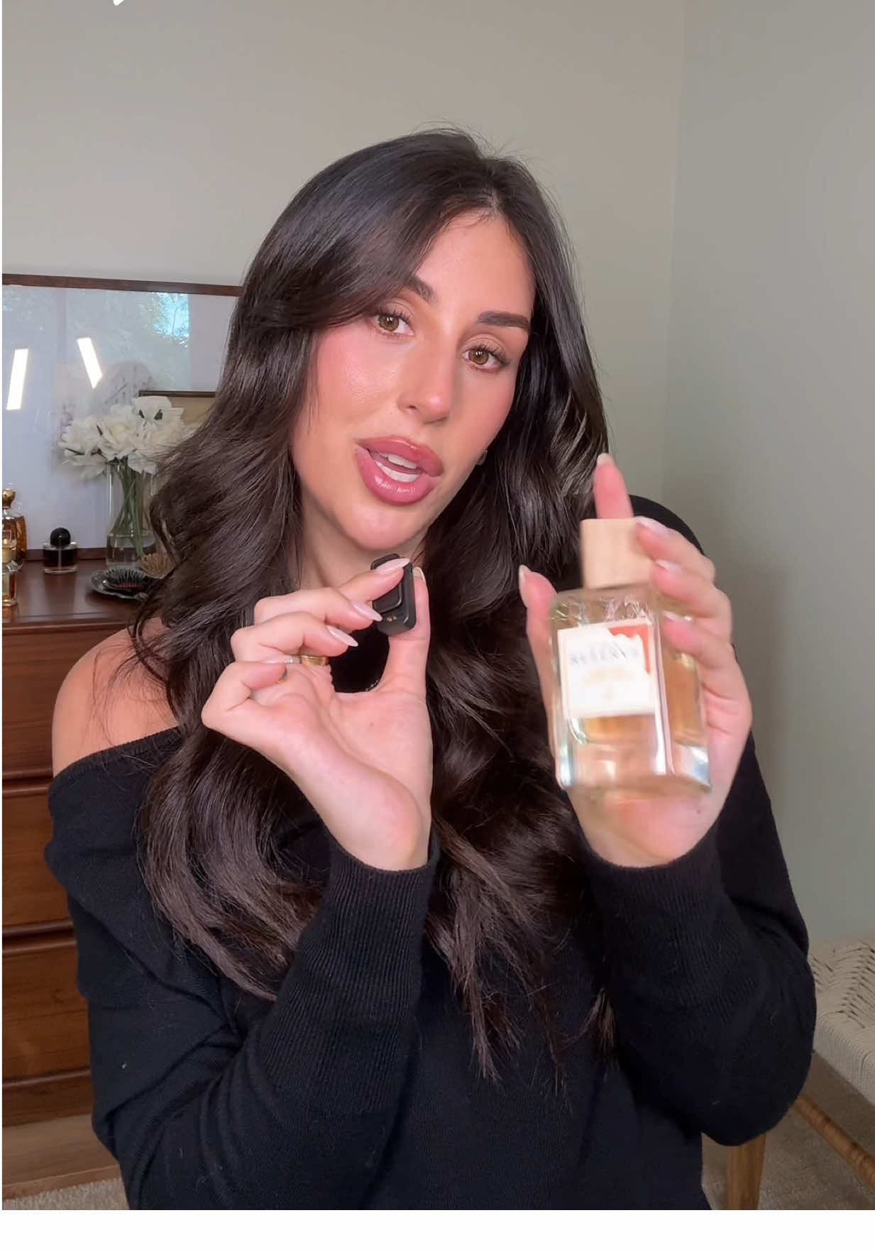 TikTok post by @carolinemstern for Clean Beauty. Caption reads: Replying to @Ann R. if you love a skin scent but....