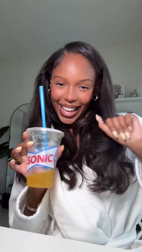 Instagram post by @shaiannj for SONIC Drive-In. Caption reads: [...] with me ft. my mango peach refresher....
