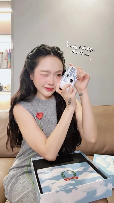 Instagram post by @lindsiepham for Moschino. Caption reads: such cute gifts from @dafc_vietnam @moschino x....