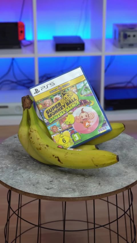 Instagram post by @retrogamingtommy for Firmoo. Caption reads: PS5 💙 Have you played Super Monkey Ball?....