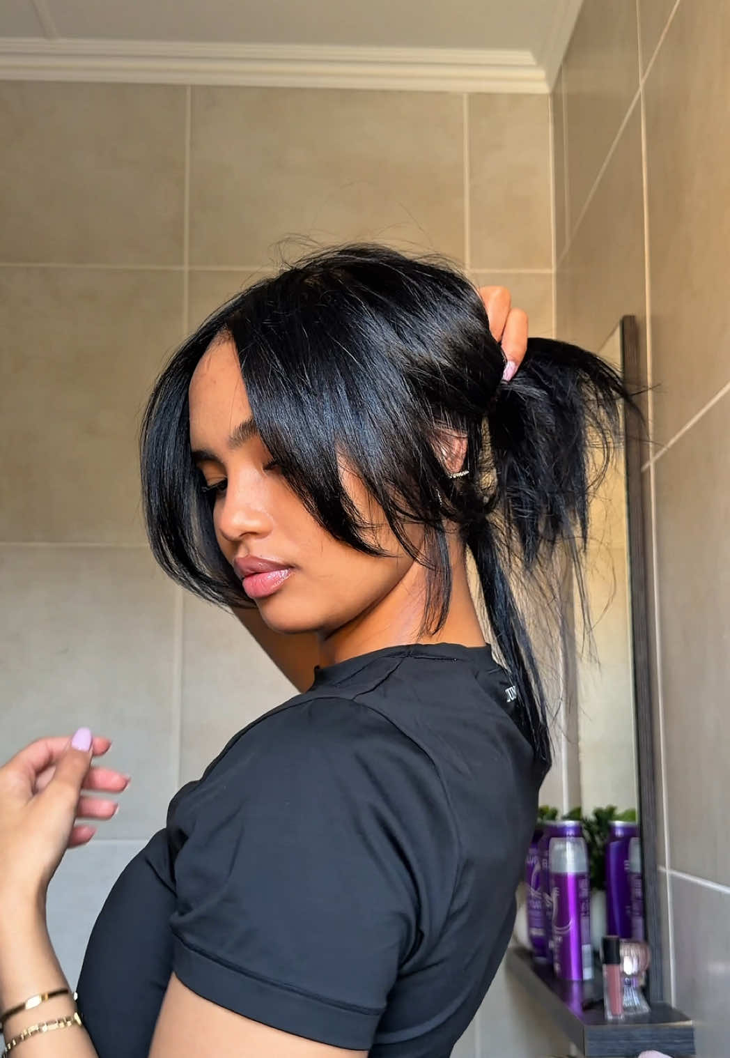 TikTok post by @tatum__m for L'Oréal Paris South Africa. Caption reads: The volume, the bounce, the softness… this range....