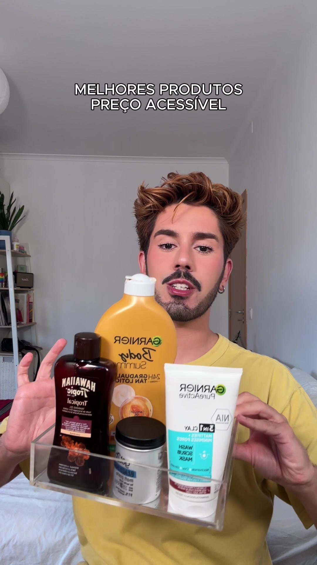 TikTok post by @mr.andre.fernandes for Hawaiian Tropic. Caption reads: [...] Active 3in1 Clay @got2b Beach Matt Paste....