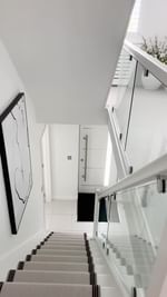 Instagram post by @carlyshomeandlifestyle_ for The Palladio Door Collection. Caption reads: My stair carpet and both landings are in the same....