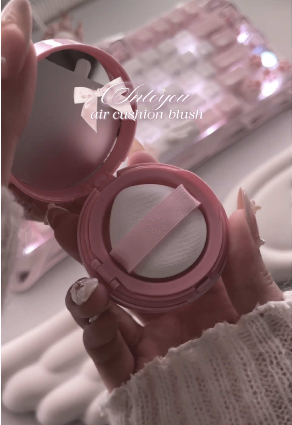 TikTok post by @cygneix for INTO YOU. Caption reads: i’m in love with this air cushion blush....