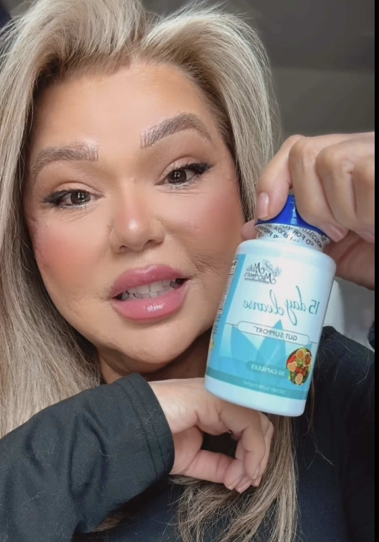 TikTok post by @sandiesdigitalworld for Mila Miamor. Caption reads: @MilaMiAmor 15 Day Cleanse - Gut and Colon [...].