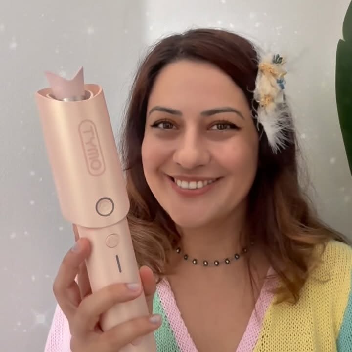 Instagram post by an influencer for TYMO BEAUTY. Caption reads: [...] #TYMOCurlgo #tymobeauty #tymo #haircurler....