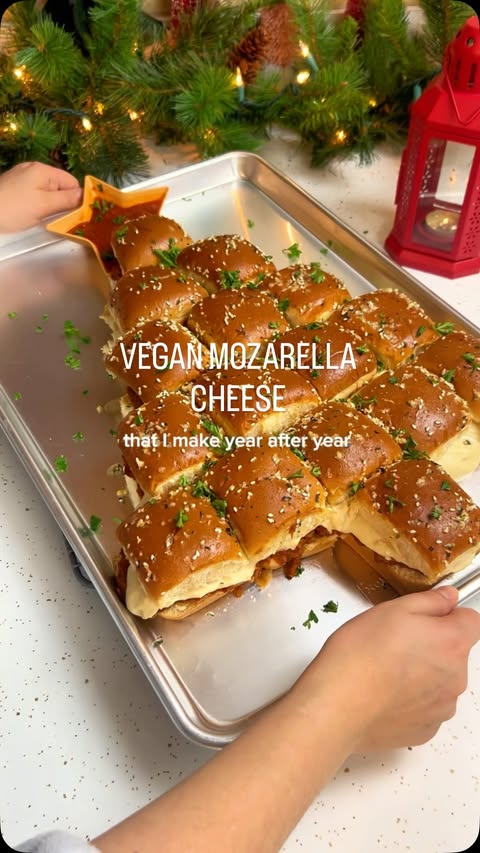 Instagram post by @theveganpigeon for Beyond Meat. Caption reads: Christmas tree sliders, but make it ✨dairy free✨....