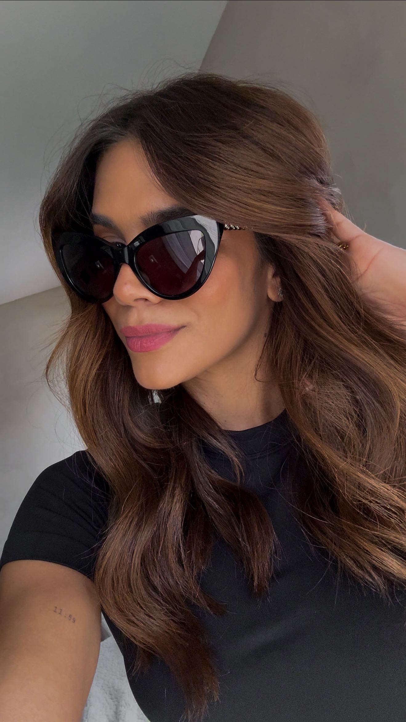 Instagram post by @carlanunez_ for bebe. Caption reads: From sun to screen with @bebe —these slay both....