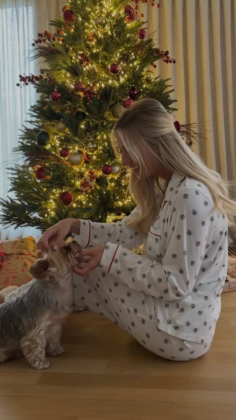 Instagram post by @celinevanouytsel for Lindt. Caption reads: [...] (un)wrap the holiday spirit 🎁 🍫 @lindt....