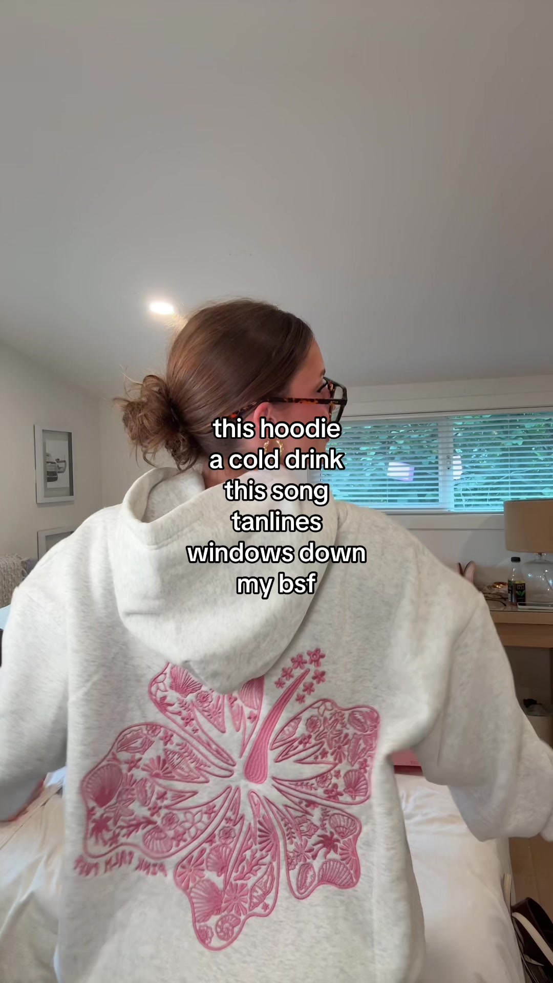 TikTok post by @taylorjoypaul for PINK PALM PUFF. Caption reads: @PINK PALM PUFF i’m obsessed 🌺 #summer #hoodie....