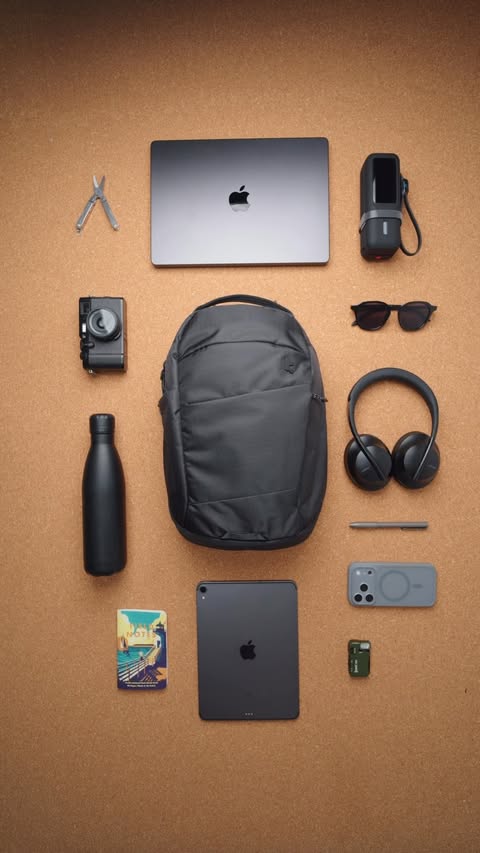 Instagram post by @stashthat.edc for Tomtoc. Caption reads: [...] but refuse to carry a whole backpack. tomtoc....