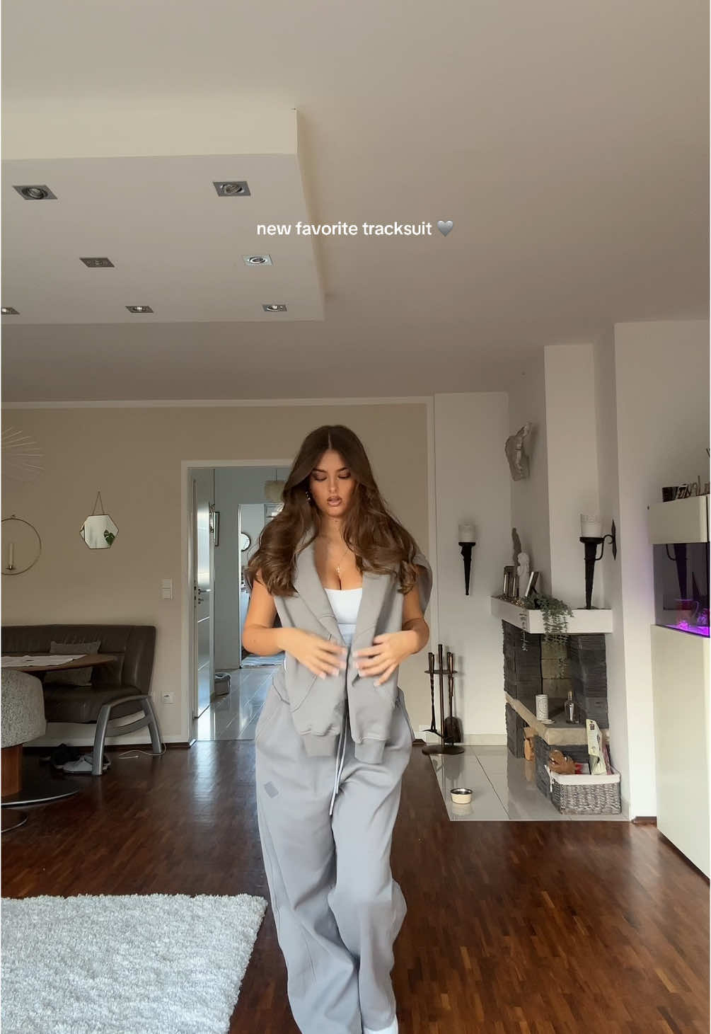 TikTok post by @noelaaaaaaaaa for Lucid Club. Caption reads: tracksuit from @Lucid Club 🩶 anzeige .