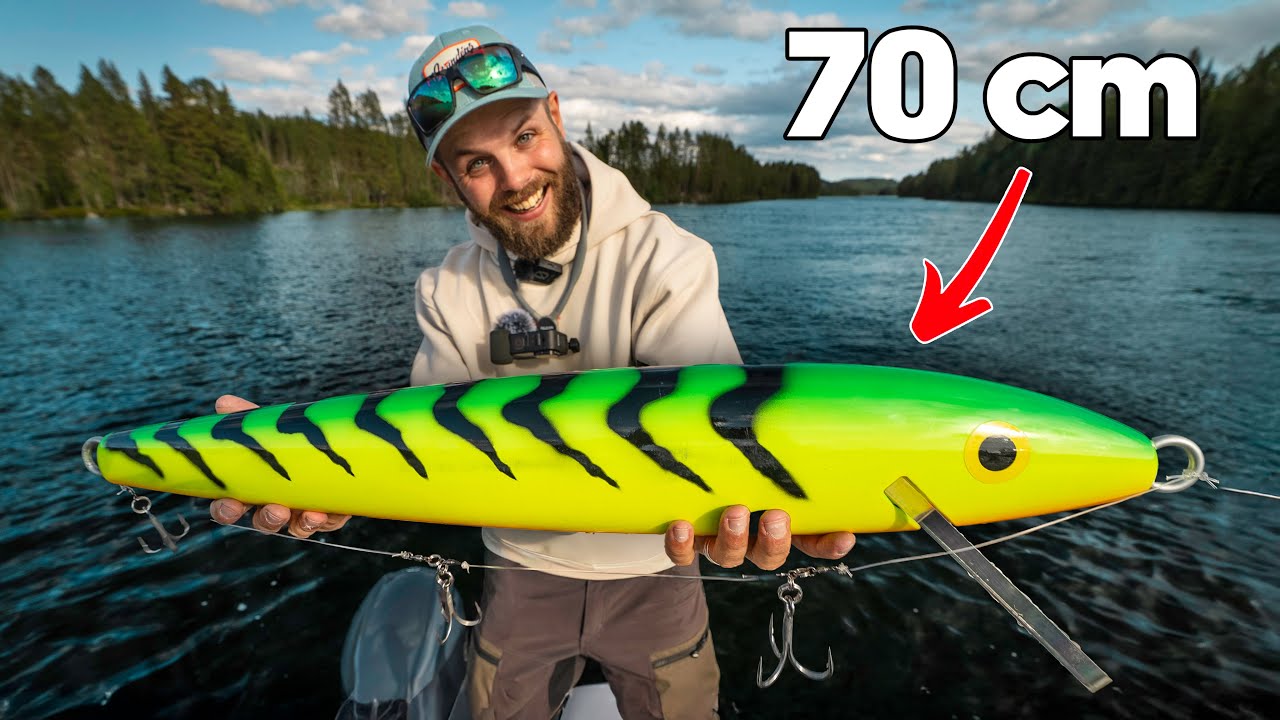 YouTube post by @Boatside for Mustad Fishing. Caption reads: Casting (!!!) the 70 cm GIANT Rapala for River....