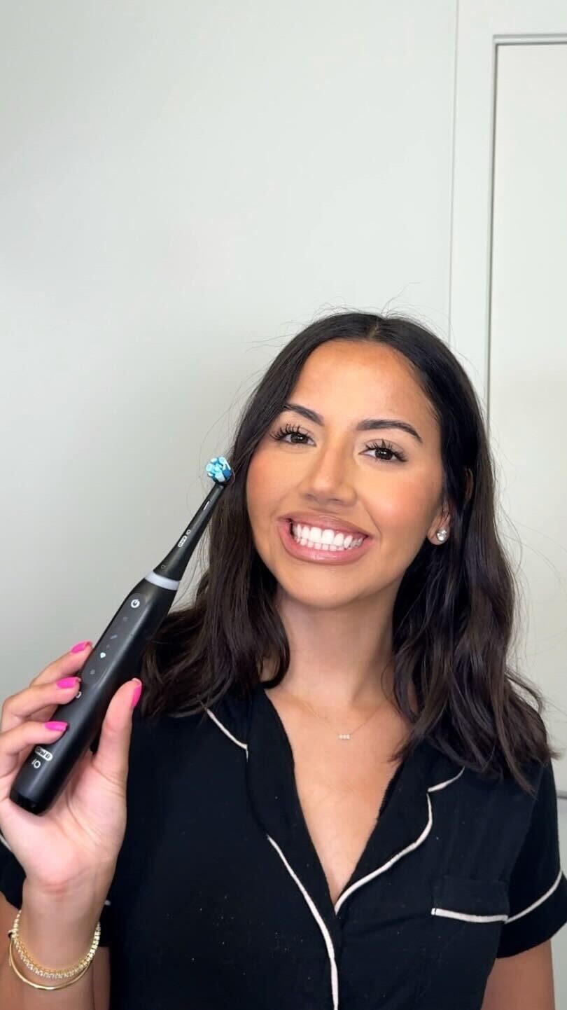 Instagram post by @ohmyletto for Oral-B. Caption reads: #OralBPartner #Ad My unwind just got an upgrade. I....
