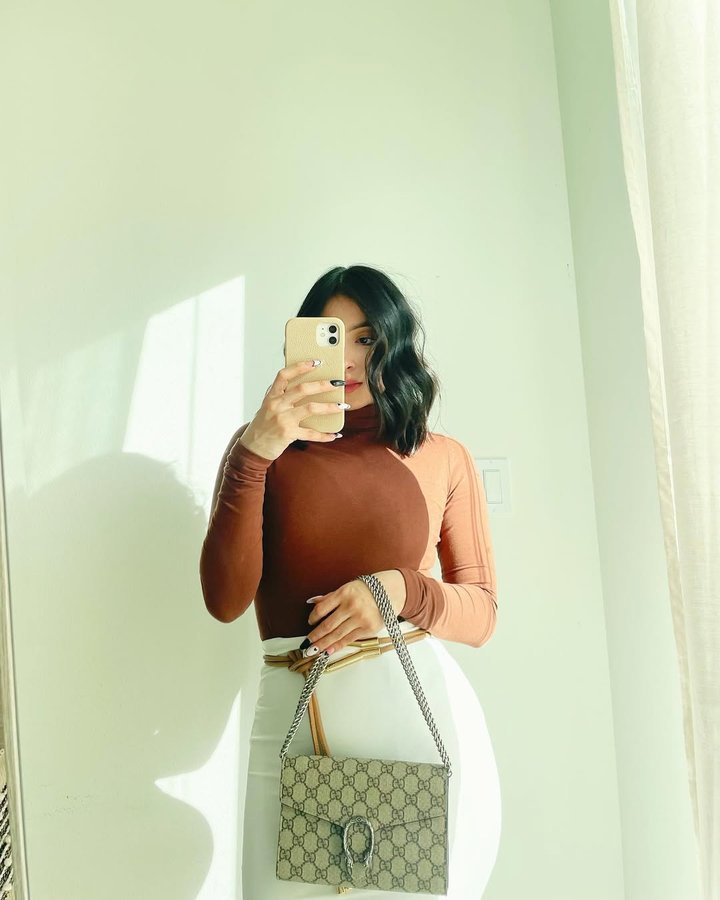 Instagram post by @stylebyamii for Los Angeles Apparel. Caption reads: This bodysuit is everything....